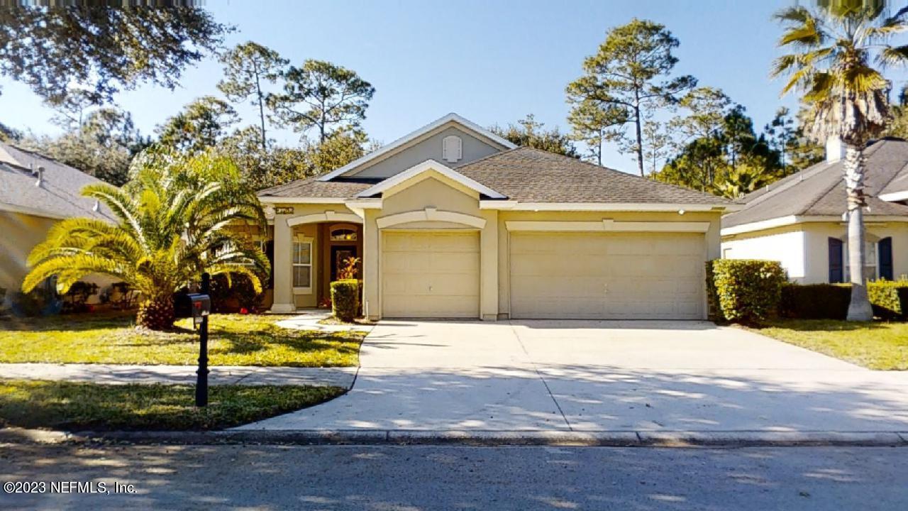 a view of a house with swimming pool