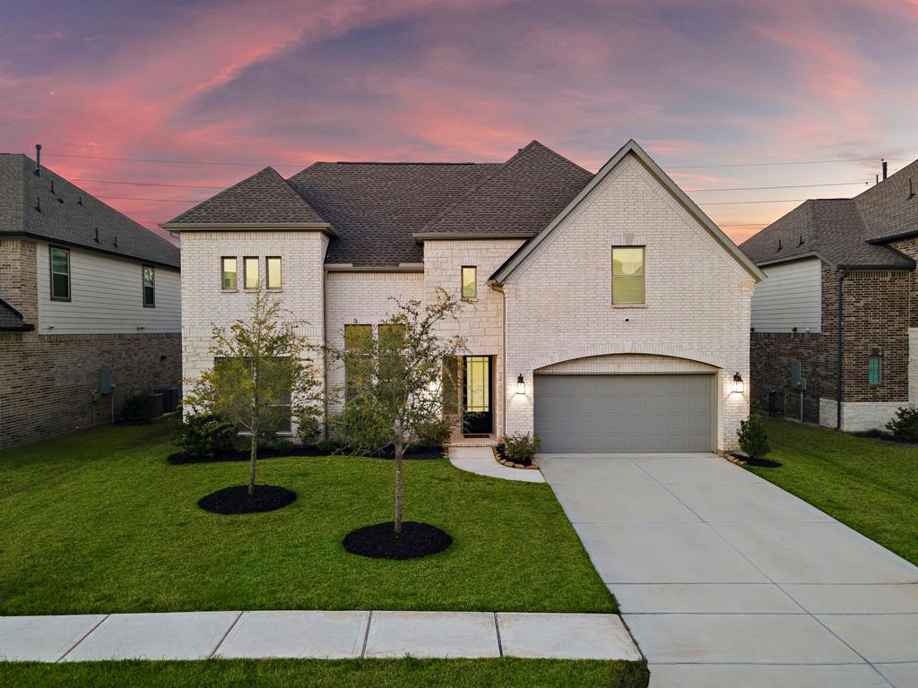 Discover practical elegance in McCrary Meadows! Built in 2022, this energy-efficient 4-bedroom, 3.5-bath home features an open-concept design with soaring ceilings, abundant natural light, and a cozy fireplace. The spacious backyard and covered patio provide serene outdoor living, with no back neighbors for added privacy. Enjoy proximity to top parks, trails, and community amenities like a pool and clubhouse, offering the ultimate suburban lifestyle!