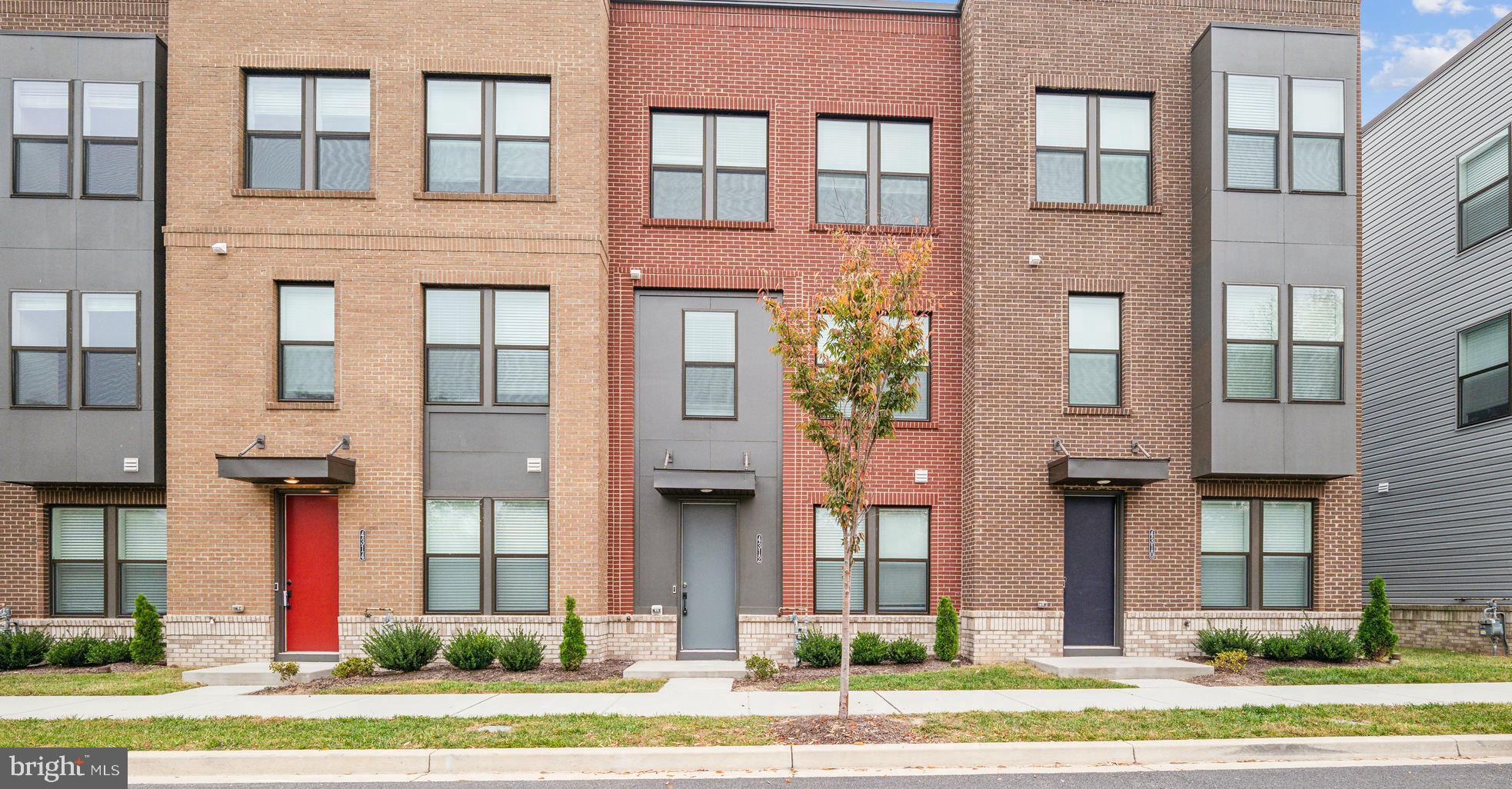 a front view of a multi story residential apartment building