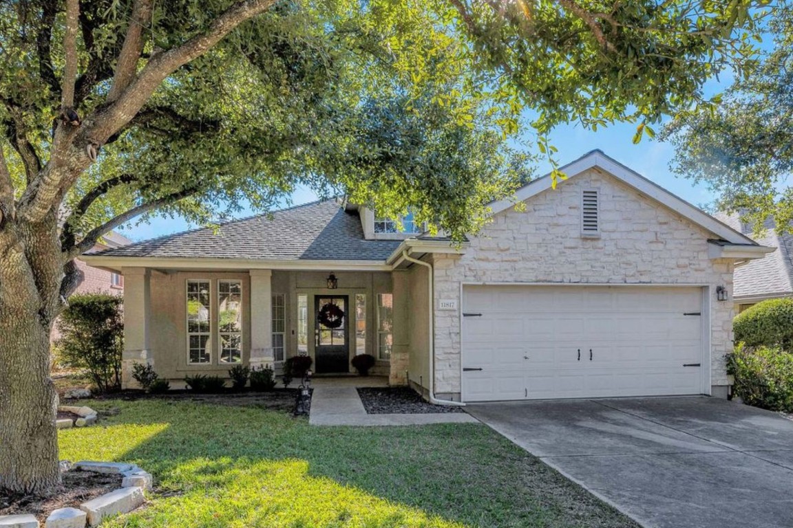 front view of a house with a yard