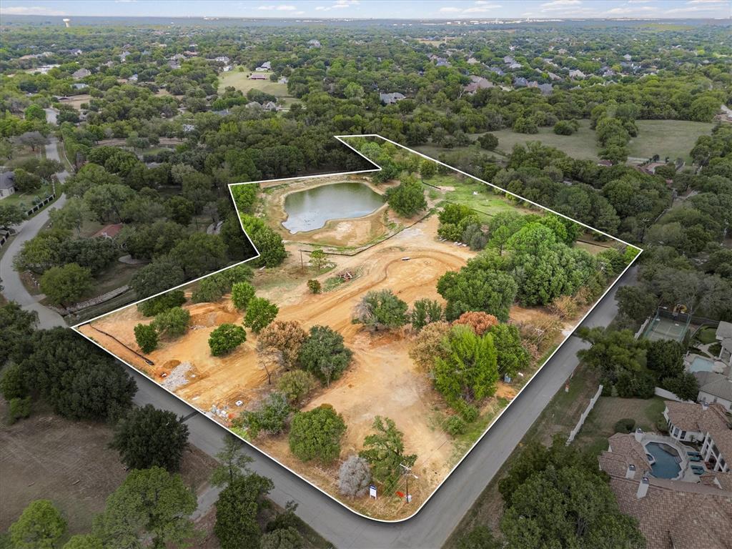 an aerial view of mountain with a swimming pool