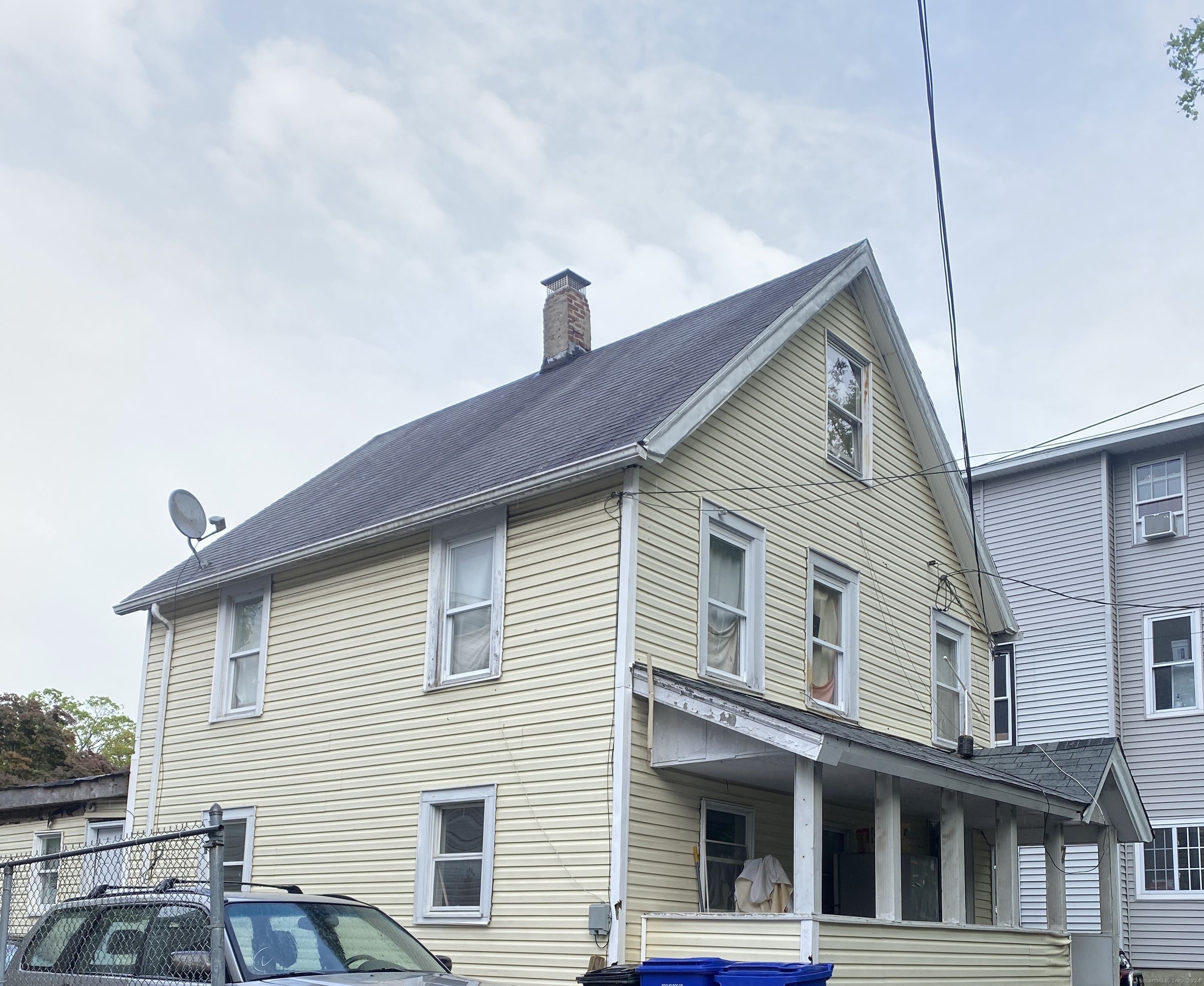 a view of a house with a roof deck