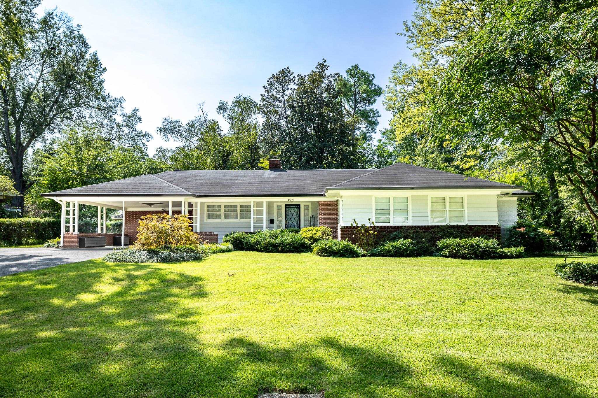 Single story home featuring a front yard