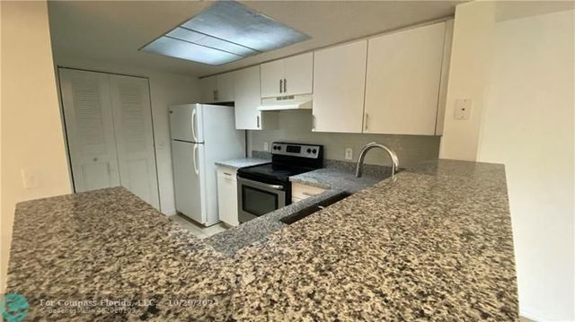 $2,300 | 5045 Wiles Road, Unit 205 | Winston Park