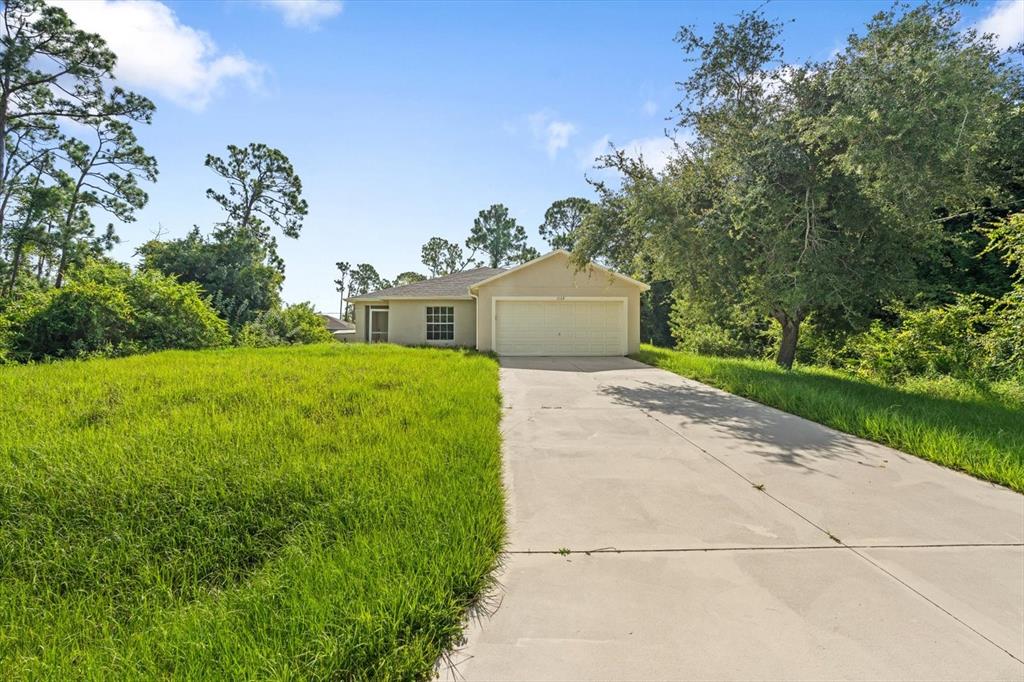 a view of a house with garden