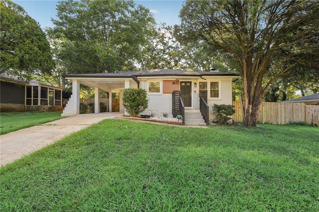 front view of a house with a yard