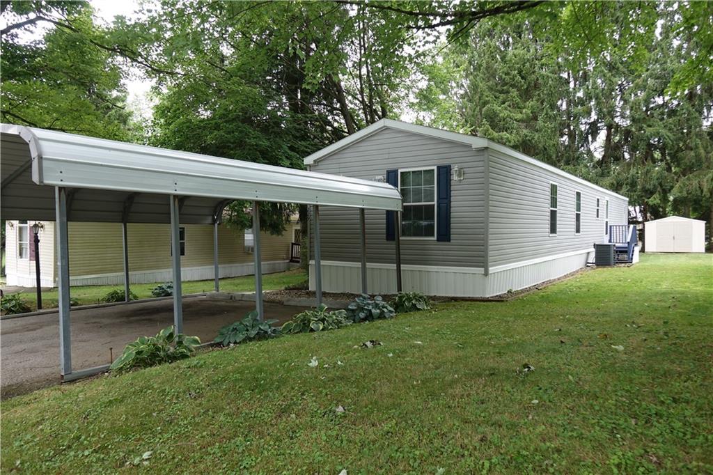 a view of a back yard of the house