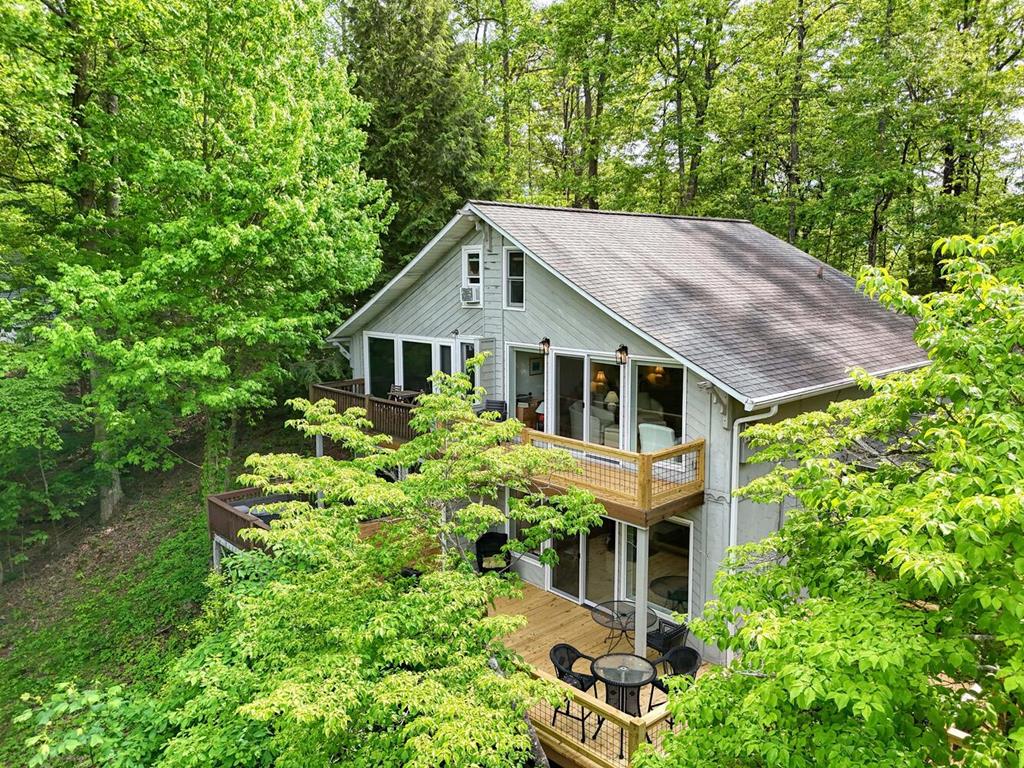 a house with trees in the background