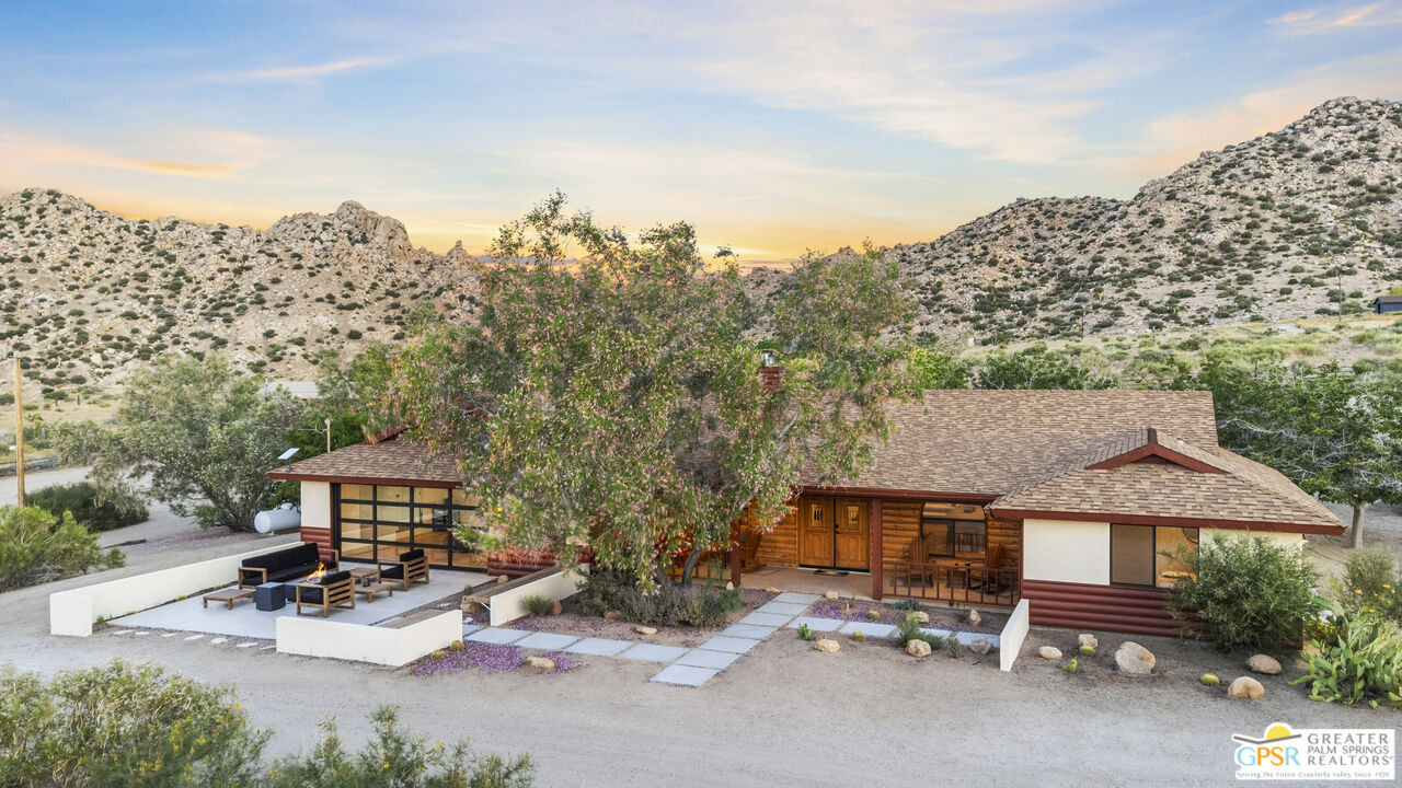 a view of a patio in backyard