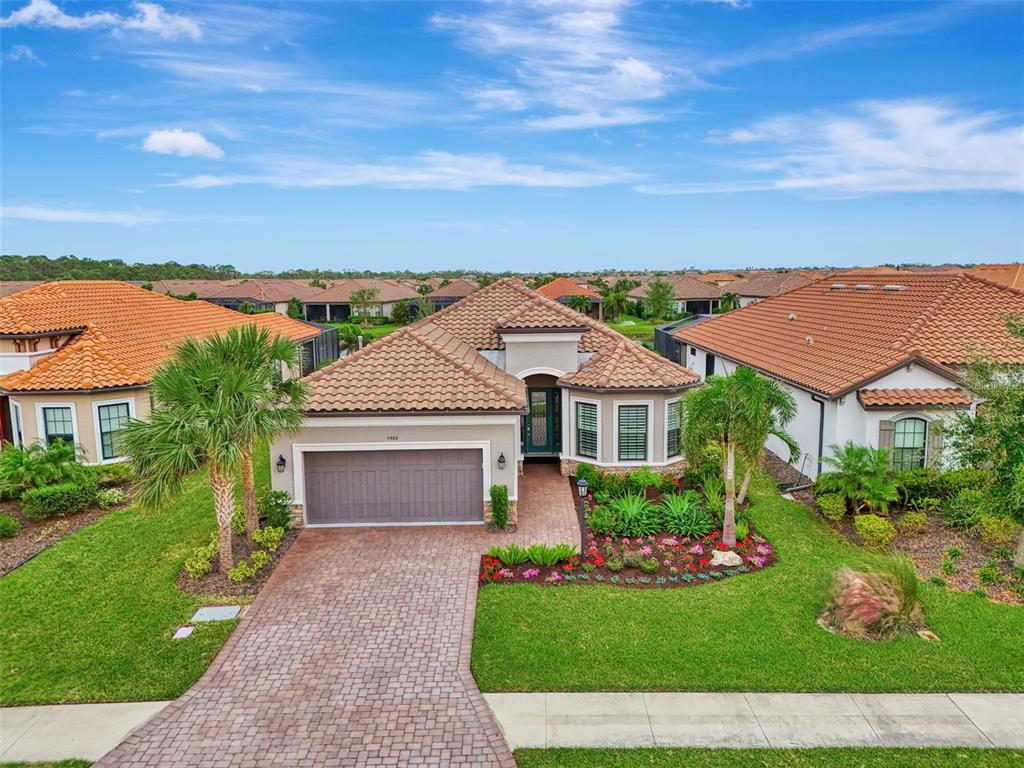 front view of a house with a yard