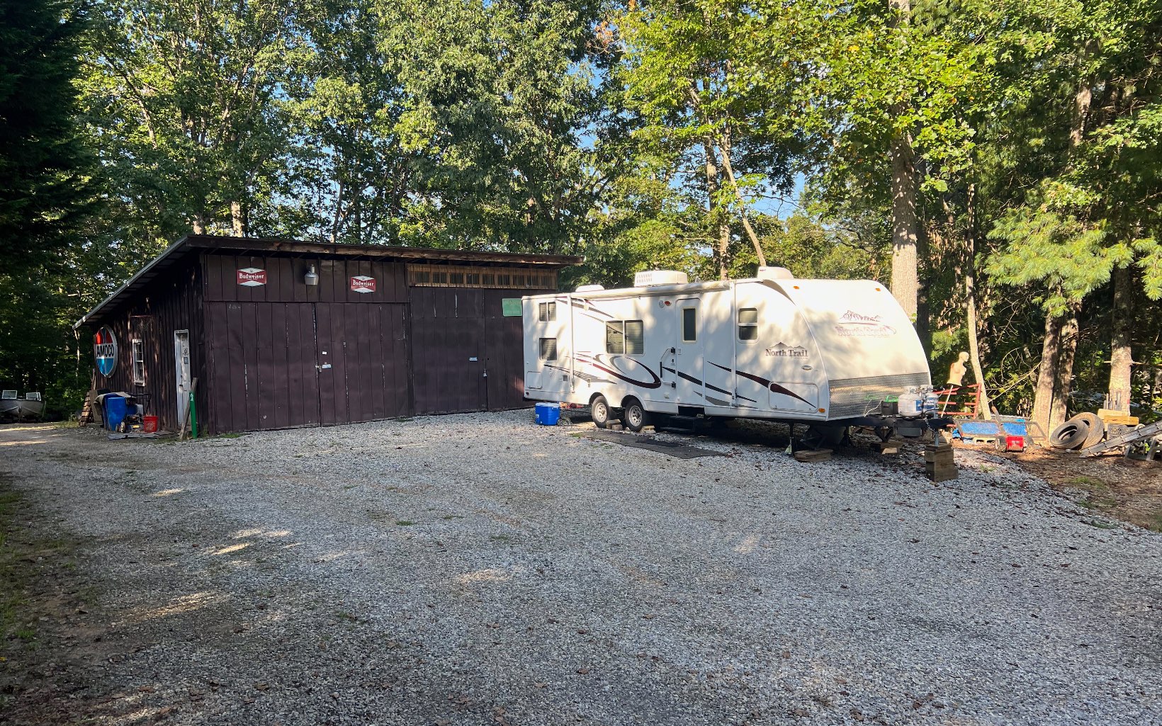 a view of a house with a yard and garage