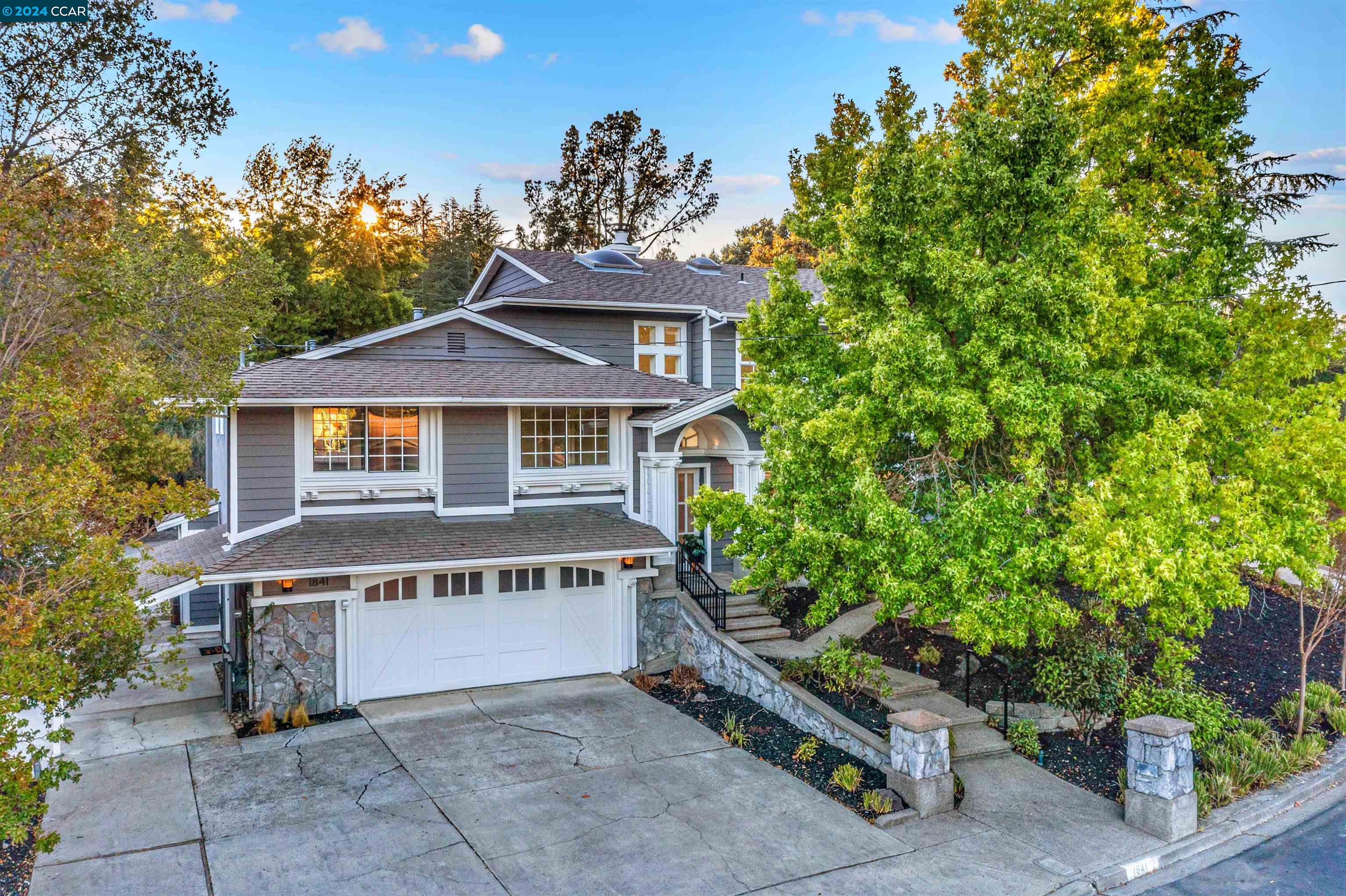 a house with trees in the background