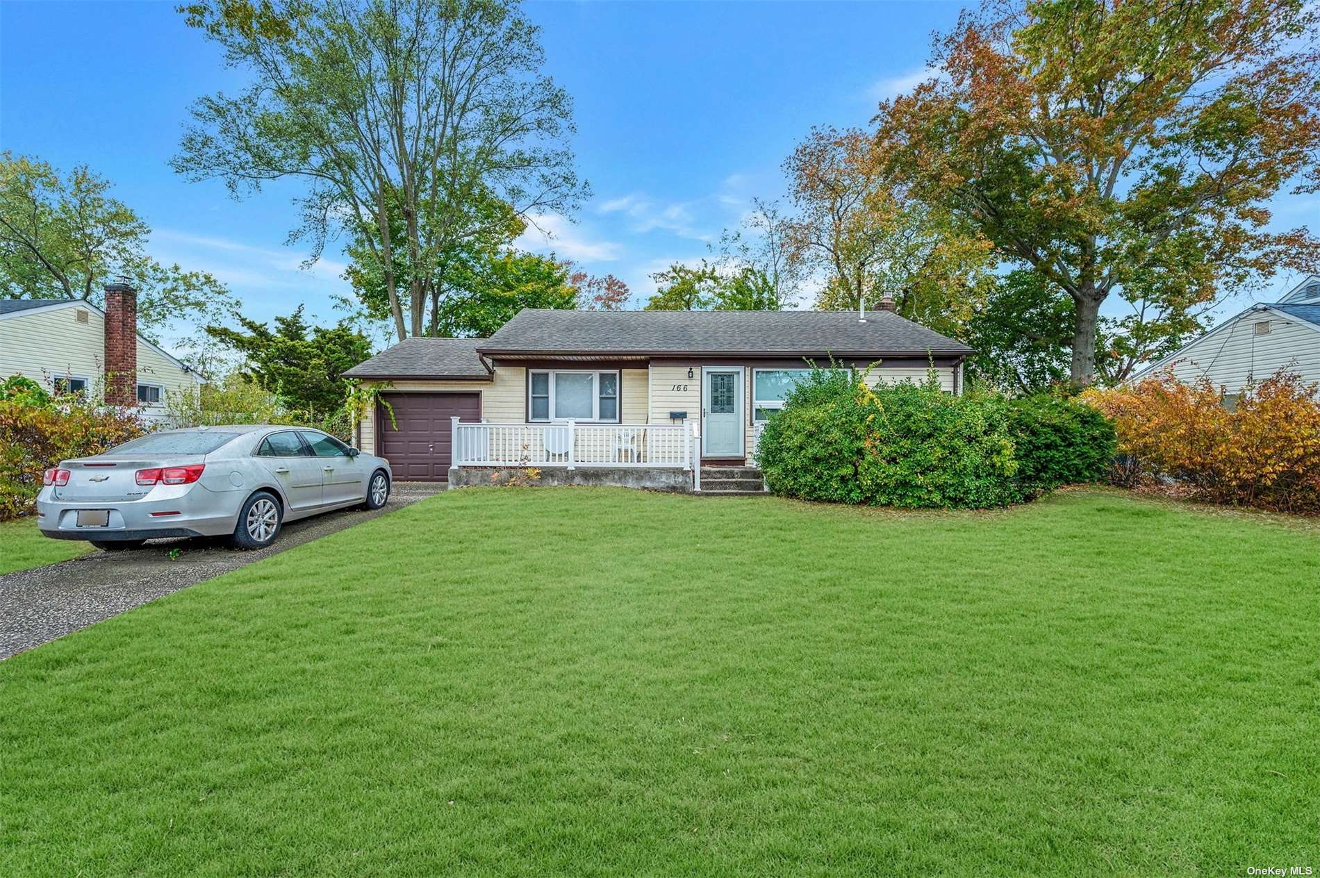 a view of a house with a garden