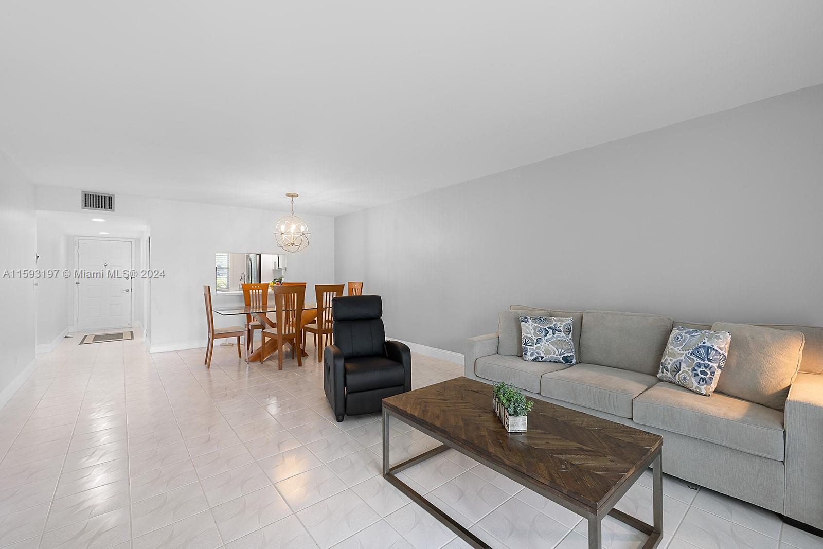 a living room with furniture and a couch