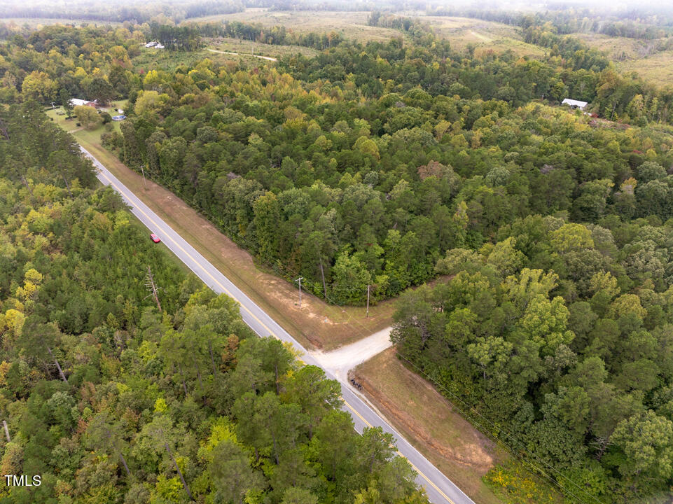 a view of a forest from a balcony