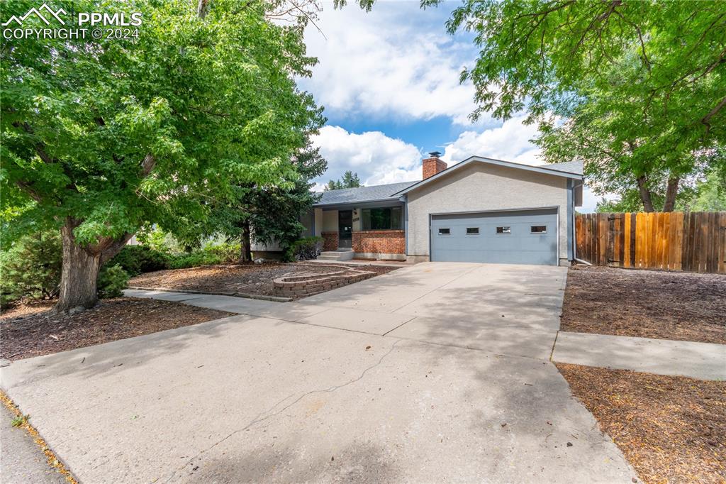 Ranch-style home with a garage