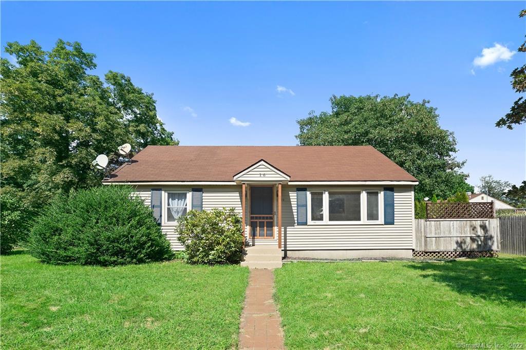 a house view with a garden space