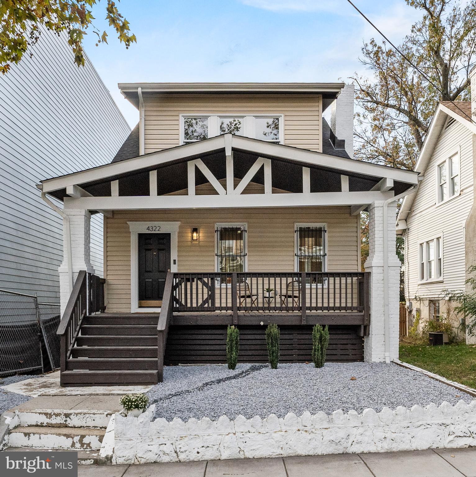 a front view of a house with a porch