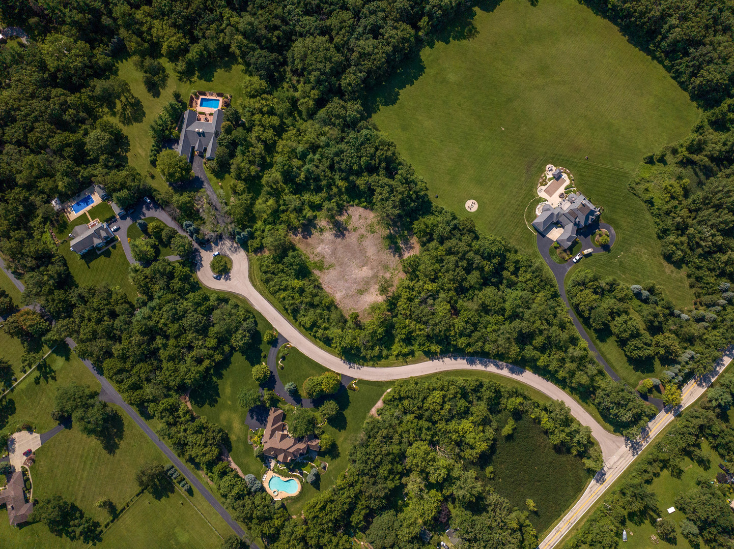 a bird view of a house with a tree