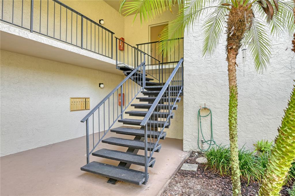 a view of entryway with a front door