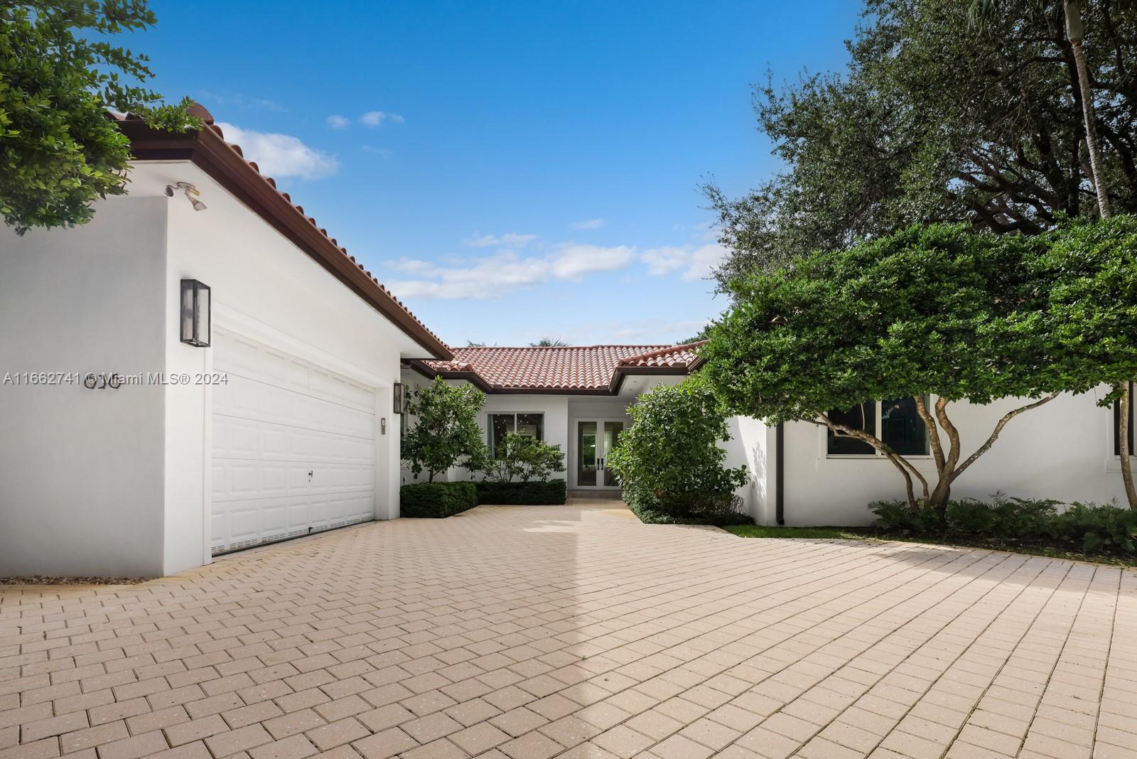 a view of a backyard of a house