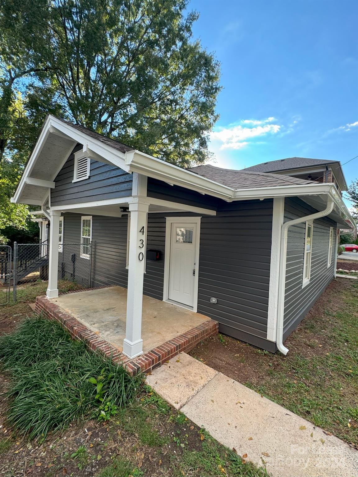 a front view of a house with a garage