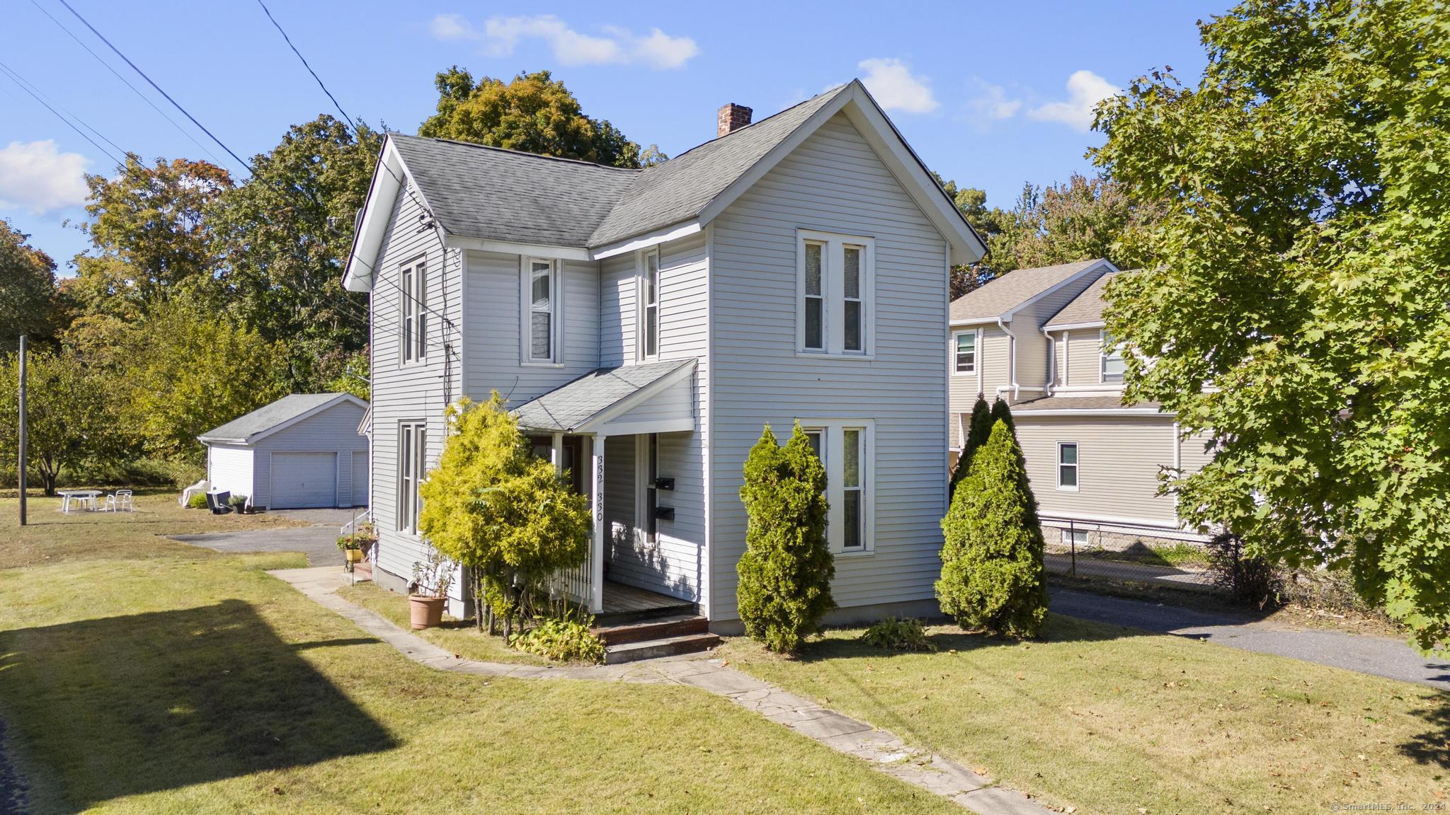 a front view of house with yard