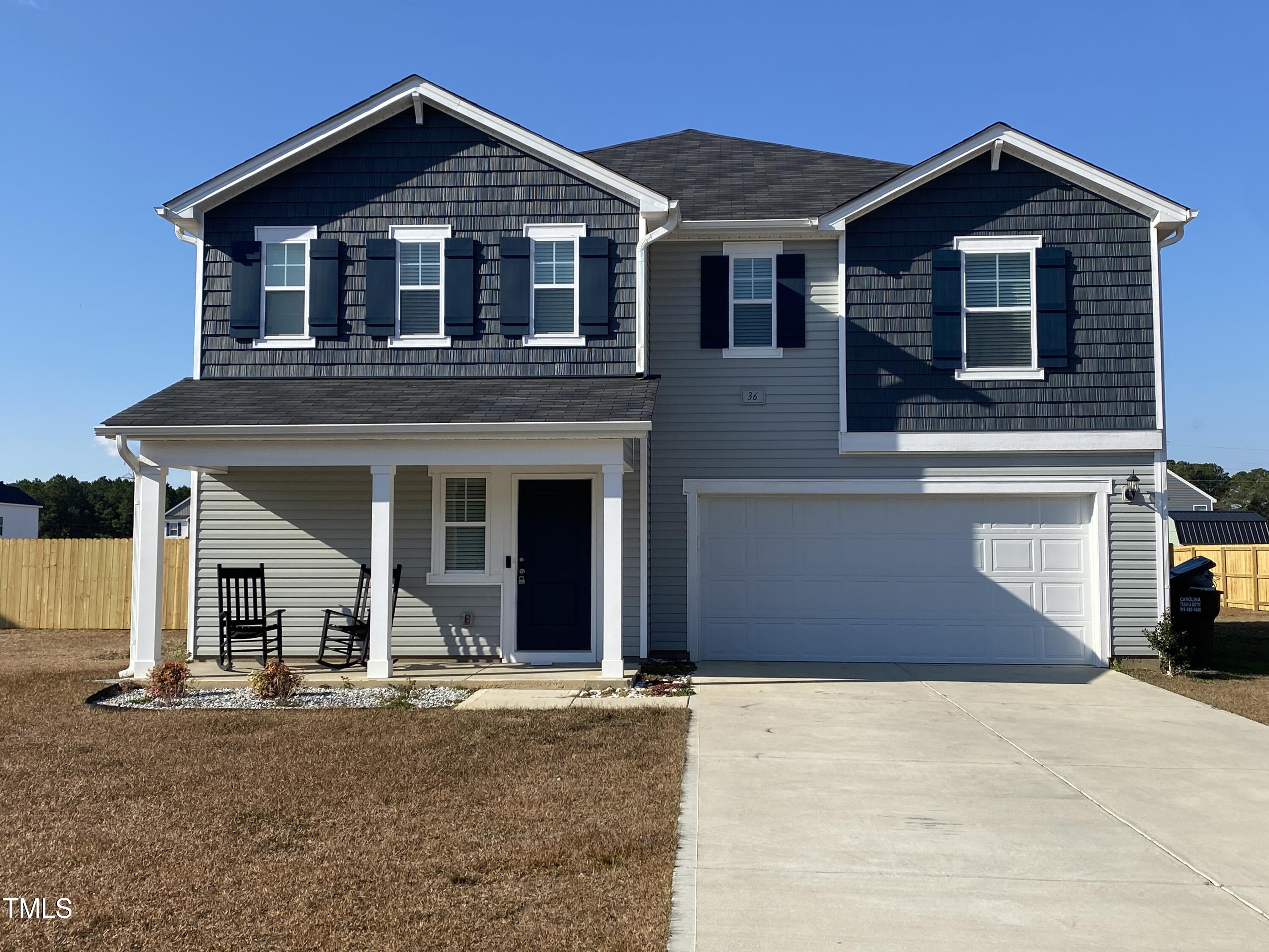 front view of a house with a street