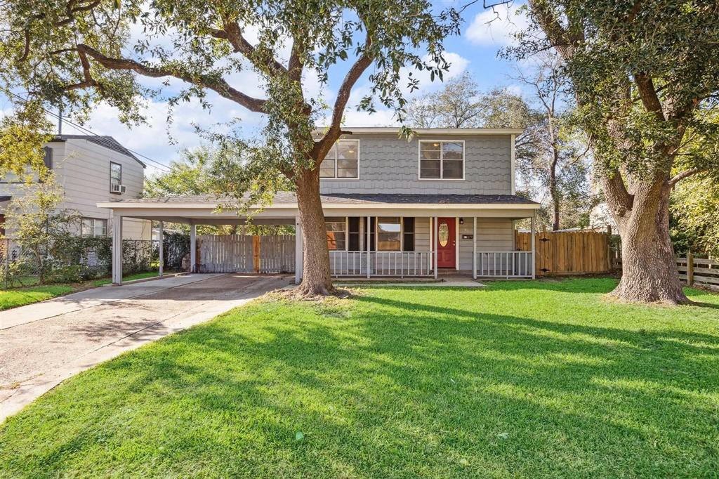 front view of a house with a yard