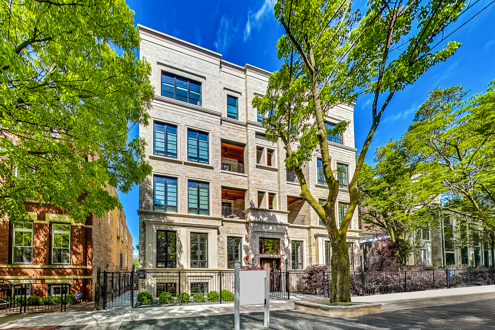 a front view of a building with street view