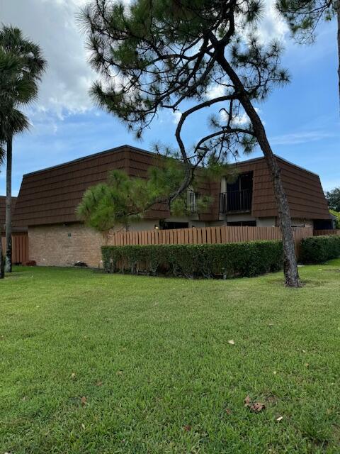 a view of a house with a big yard