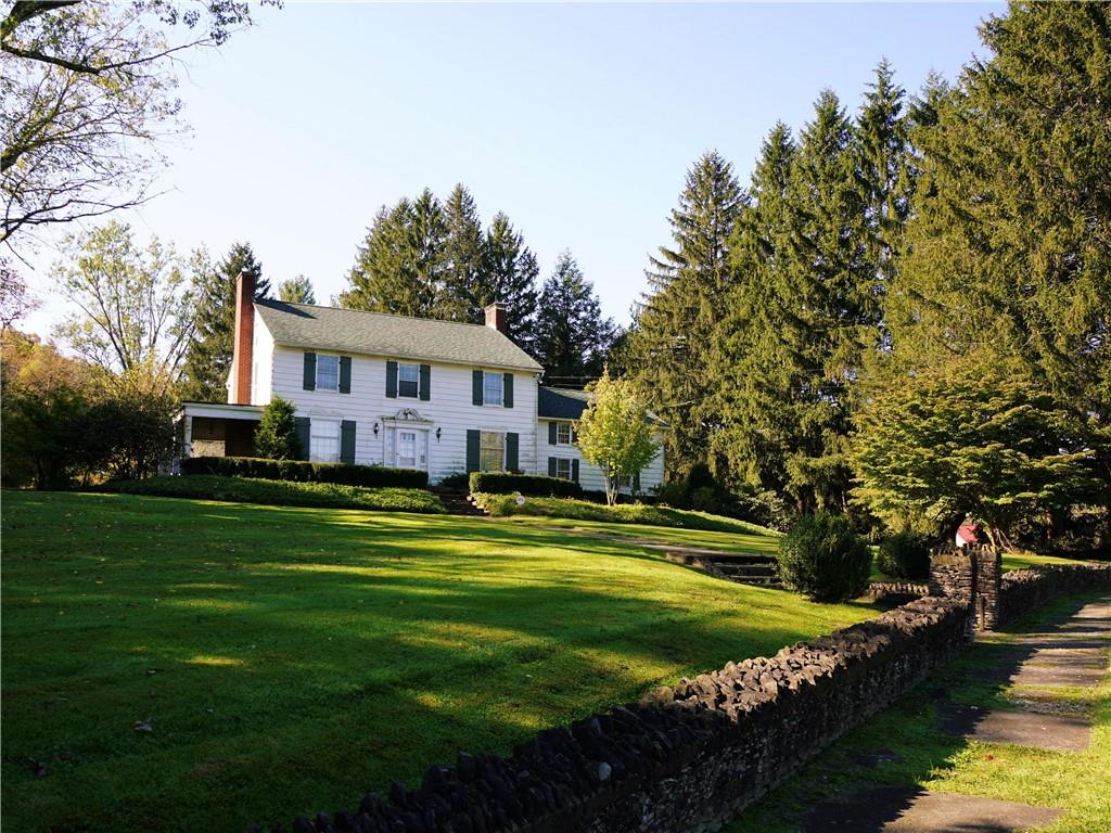 a view of a house with a big yard