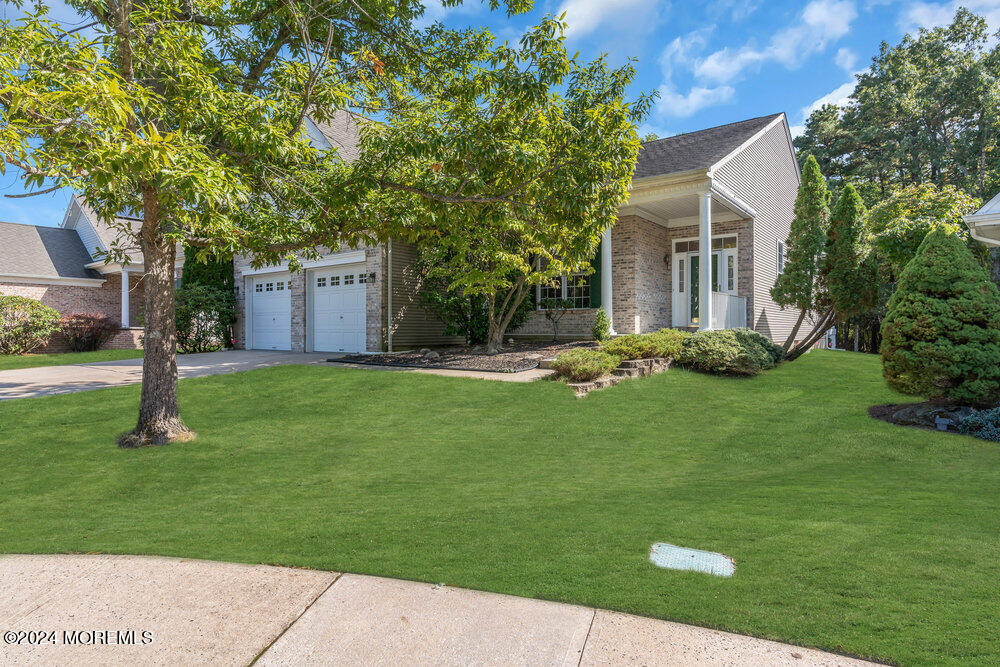 a backyard of a house with lots of green space