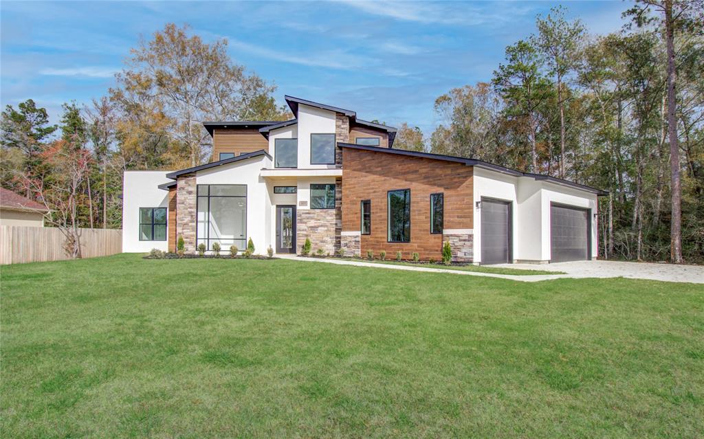 front view of a house with a yard