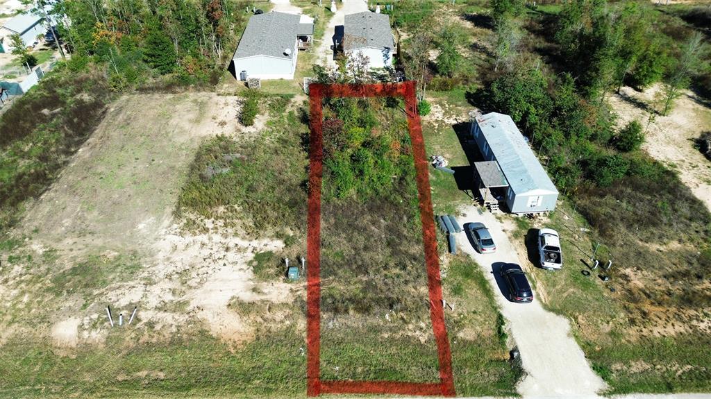 an aerial view of houses with yard