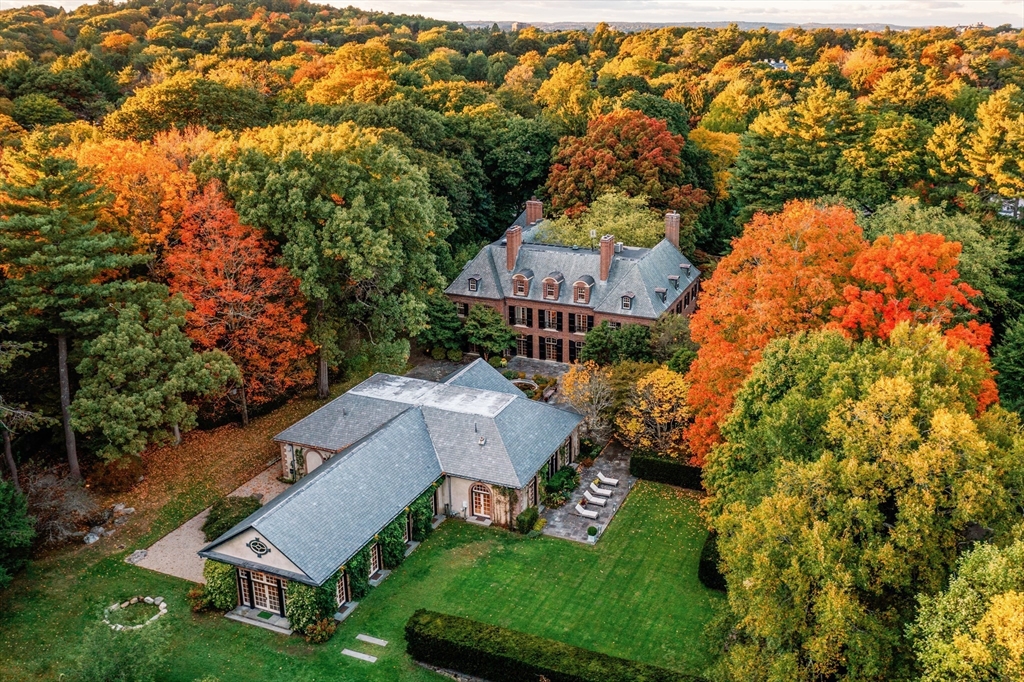 an aerial view of a house with a garden