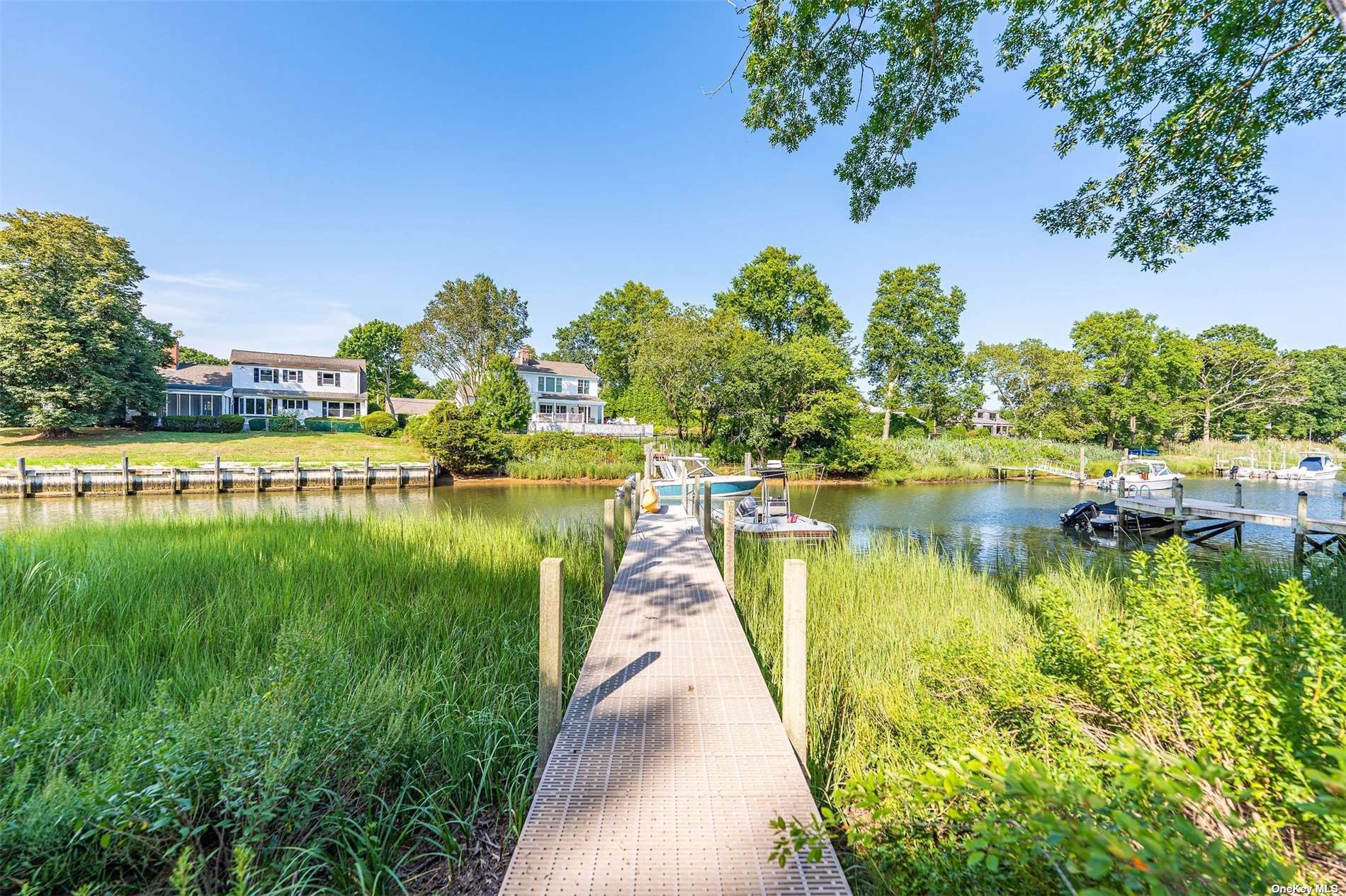 a view of a lake with a yard