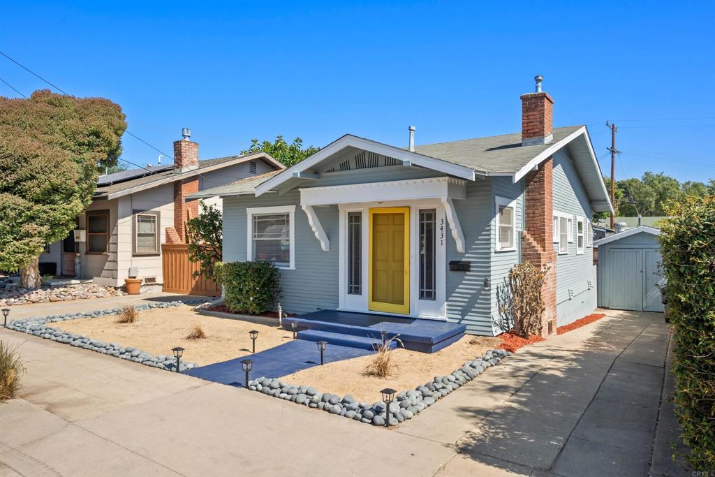 a front view of a house with a outdoor space