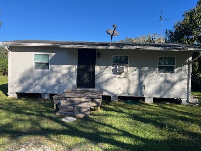 a view of a back yard of the house