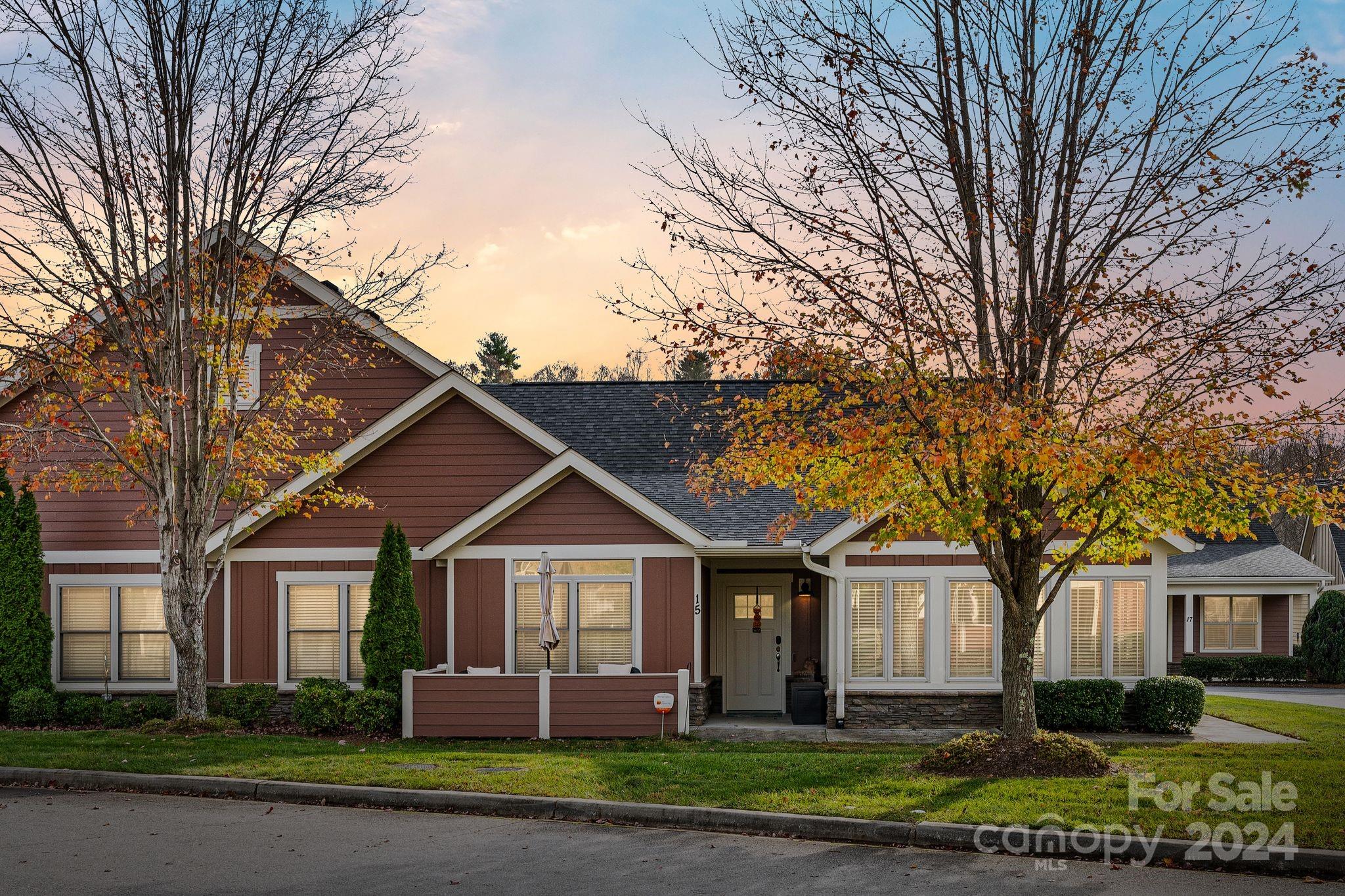 front view of a house with a yard