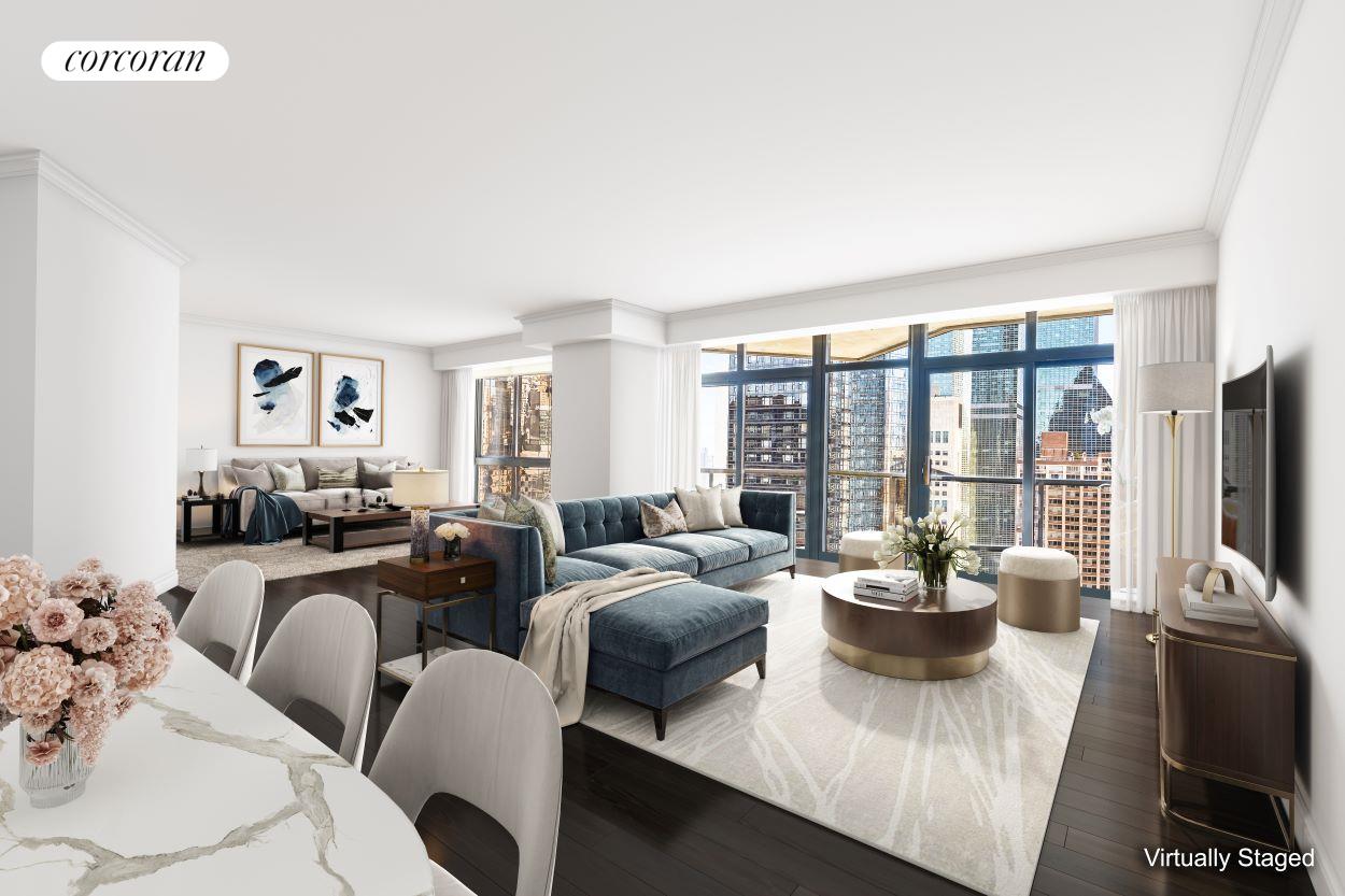 a living room with furniture a large window and a flat screen tv