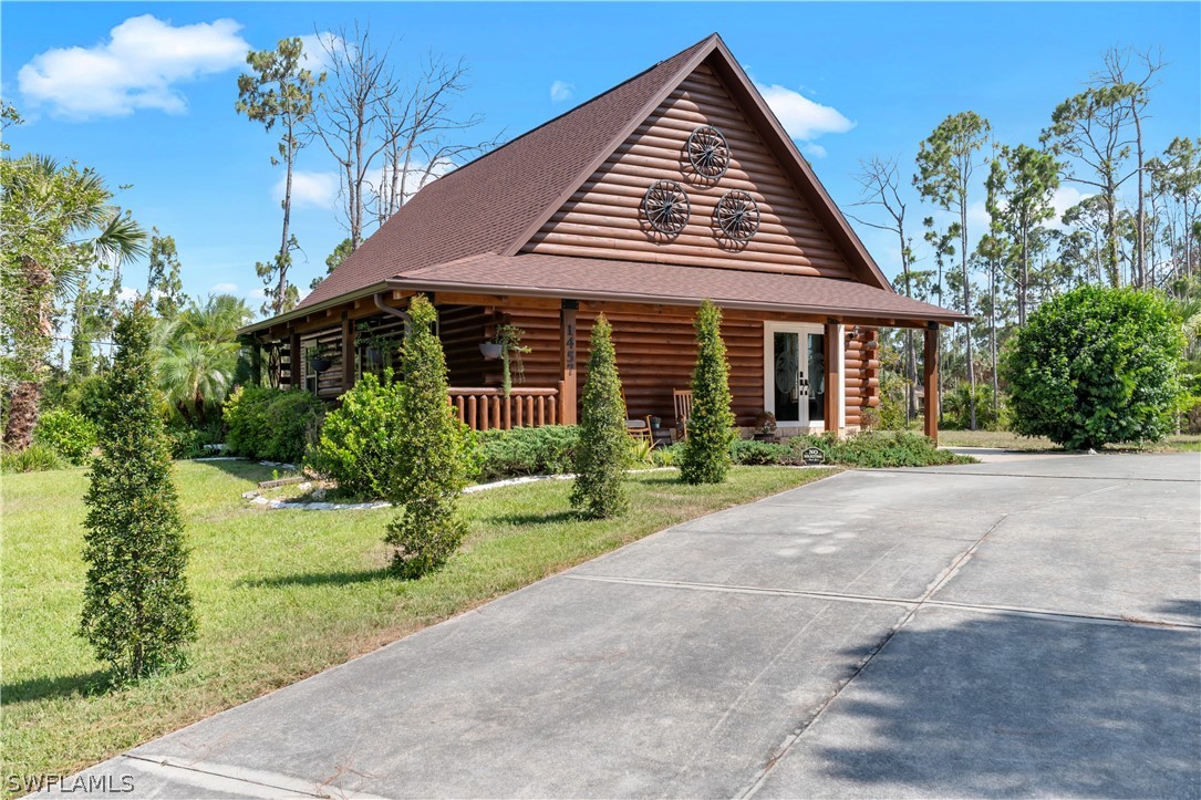 front view of a house with a yard