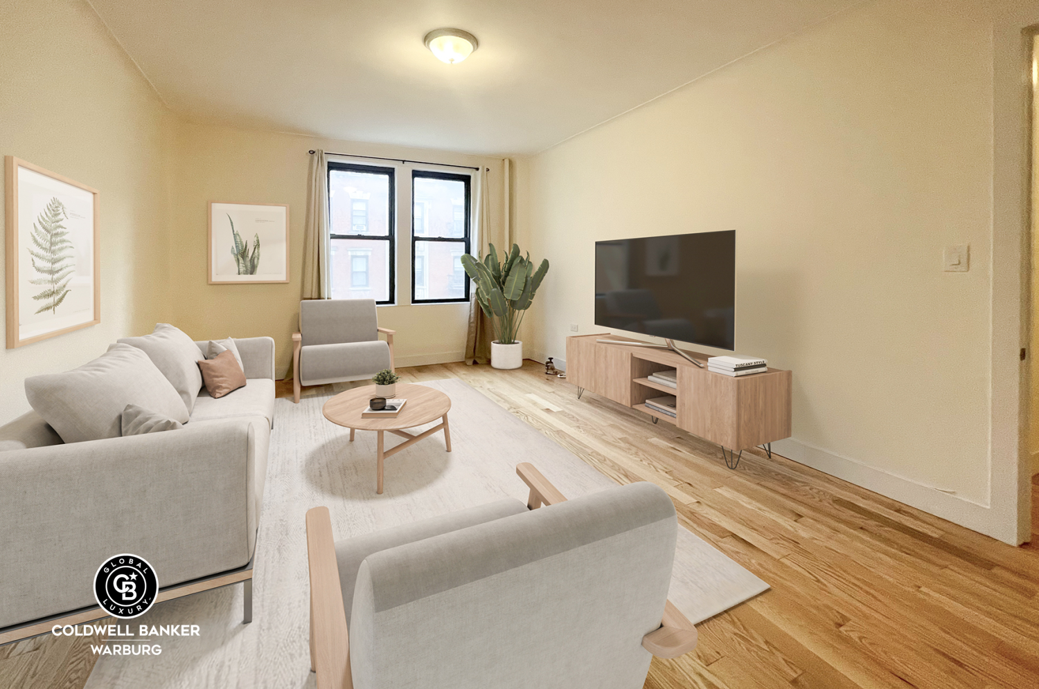 a living room with furniture and a flat screen tv