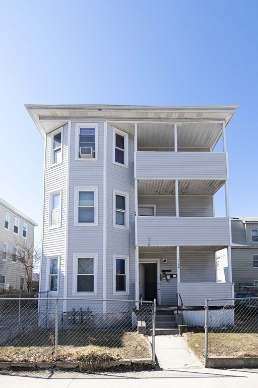 a front view of a building with street view