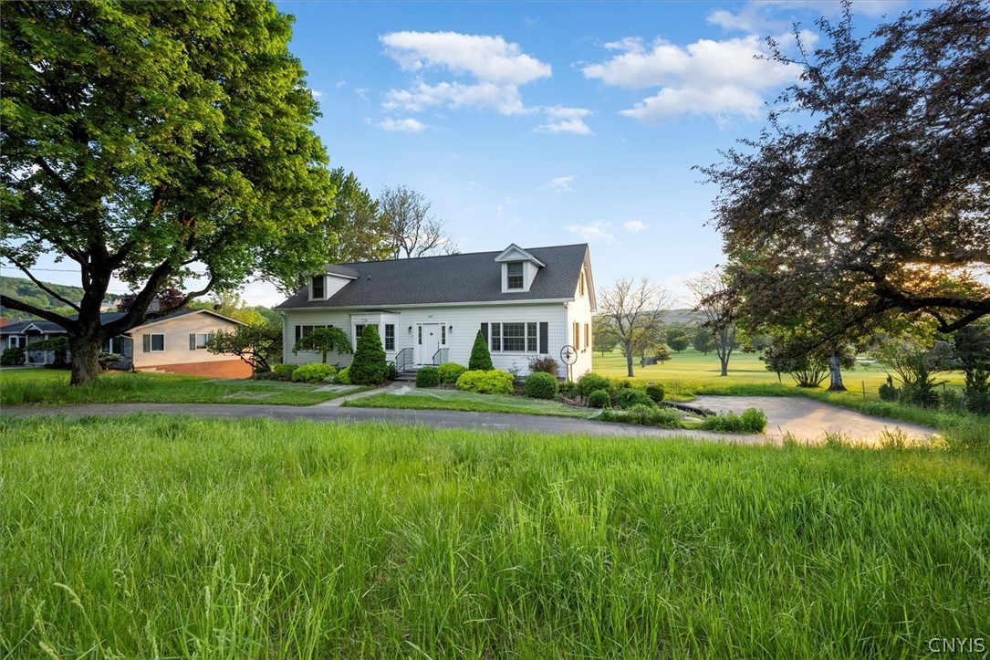 Well-designed Cape Cod style home on .36 acres