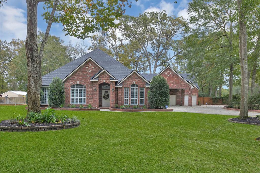 Welcome to this exquisite all brick one-story home, offering 3 bedrooms, 3 bathrooms, a 3-car garage, and a spacious workshop.