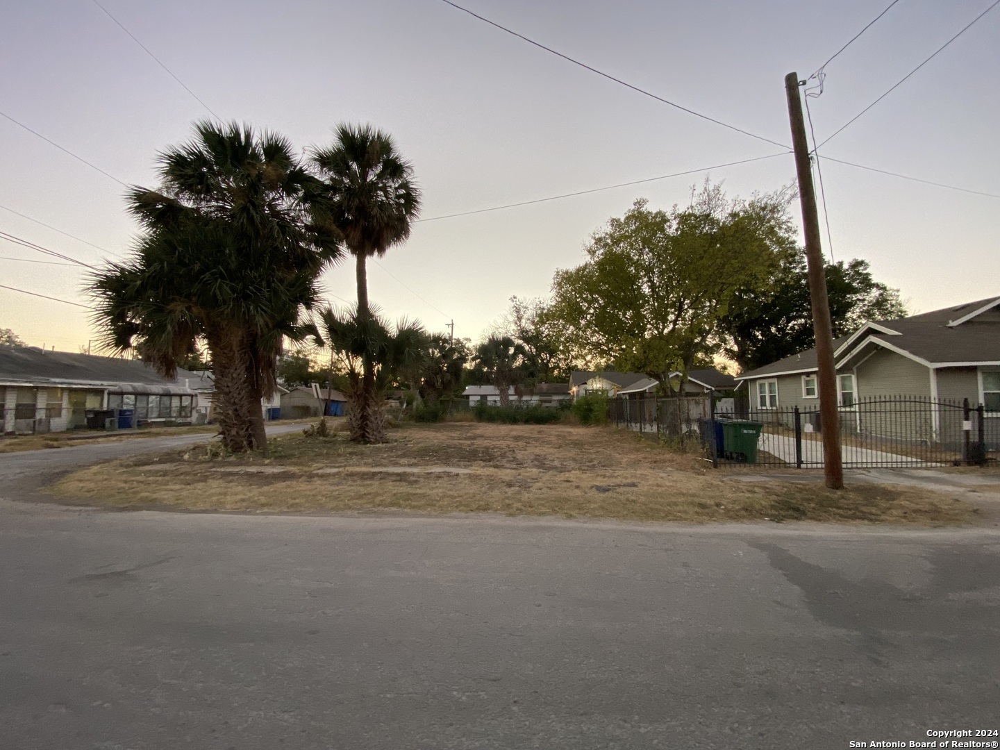 a view of a house with a yard and garage