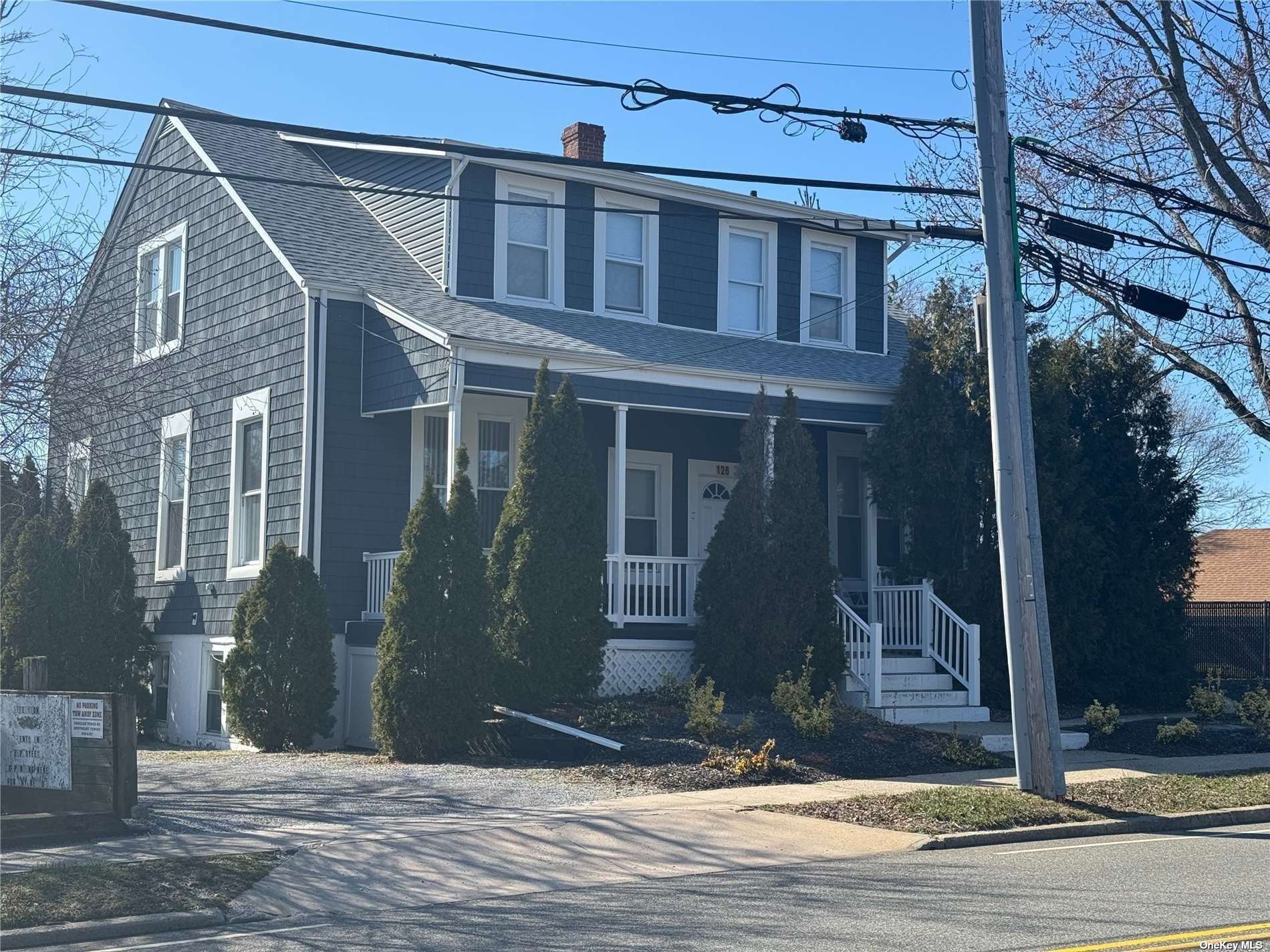 a view of a house with a street