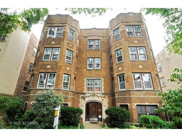 a front view of a multi story residential apartment building