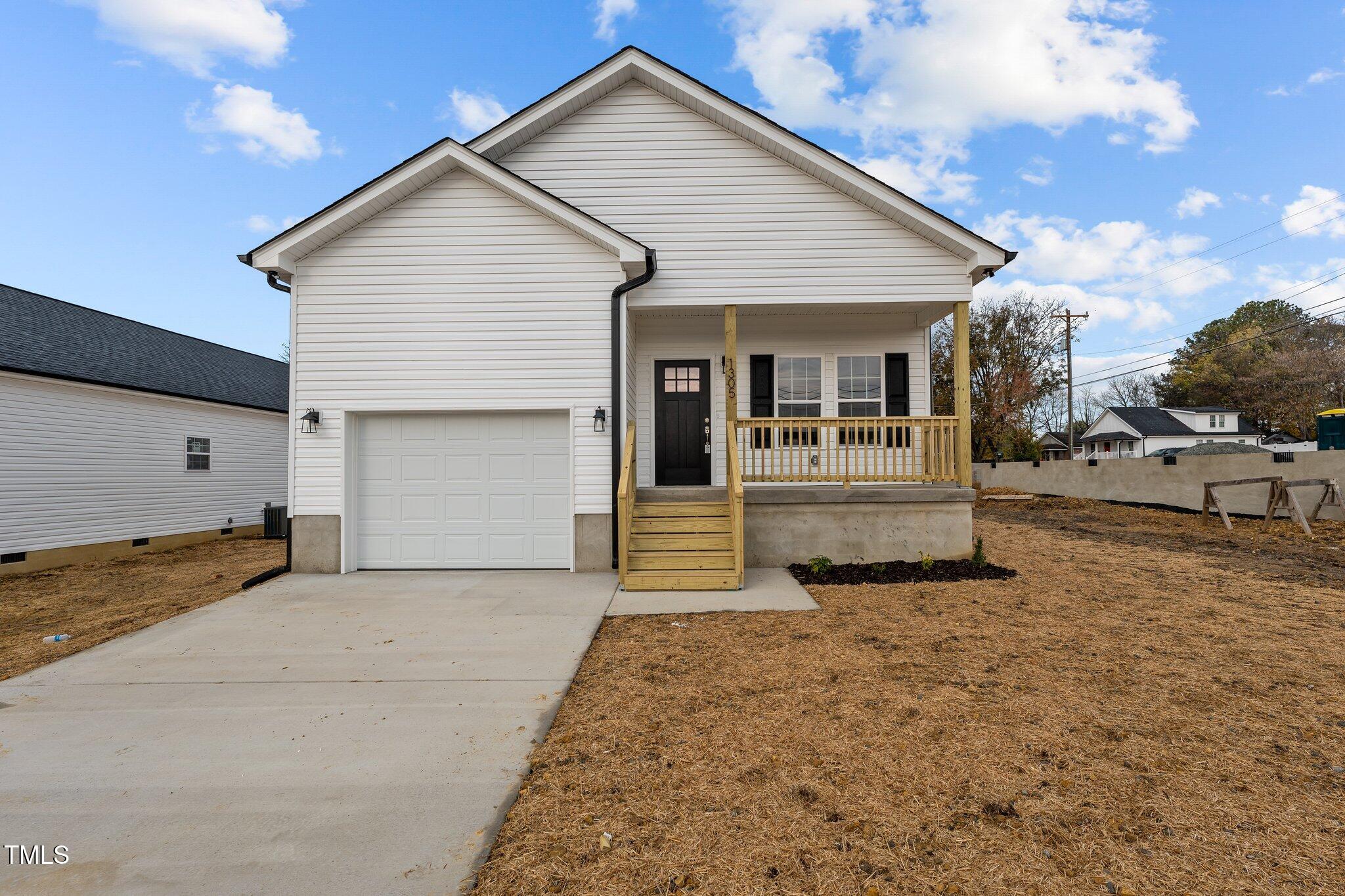 a front view of a house with a outdoor space